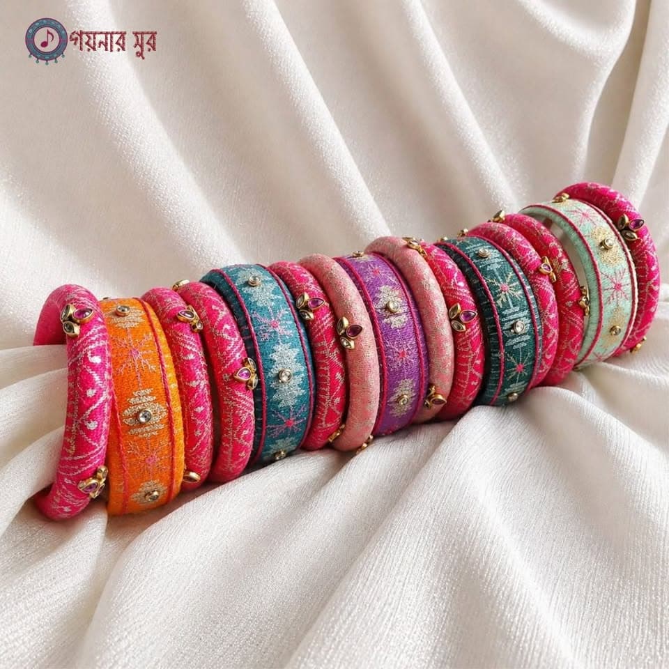 Colorful handmade bangle set on fabric